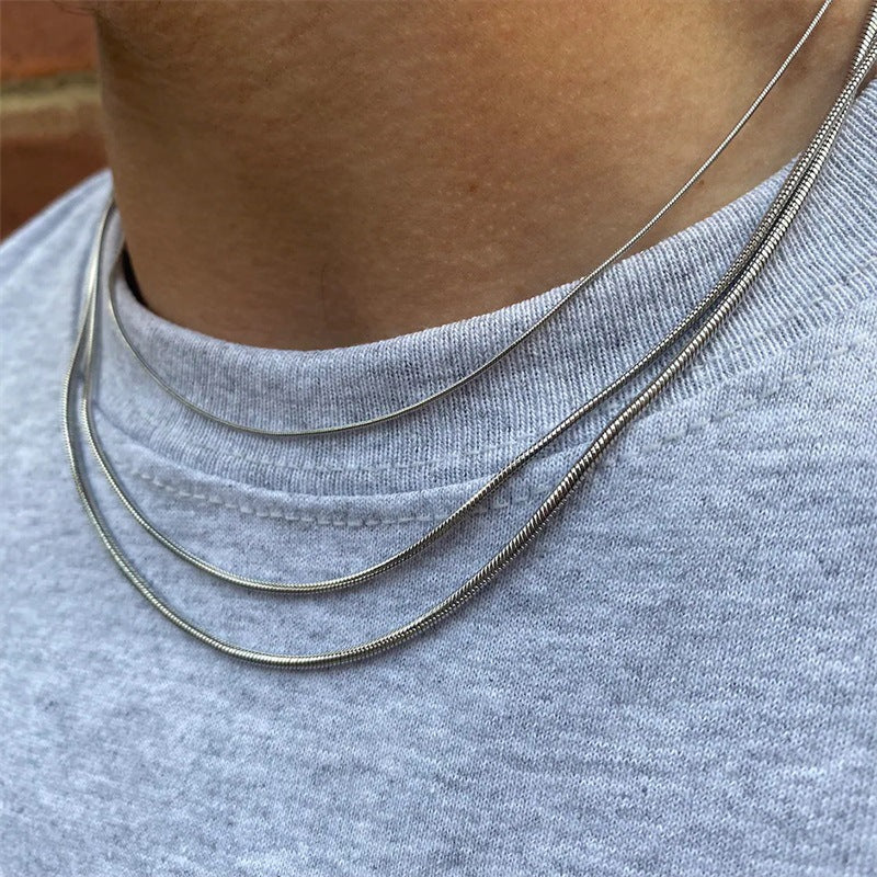 Collares de acero de acero redondo de acero titanio al por mayor